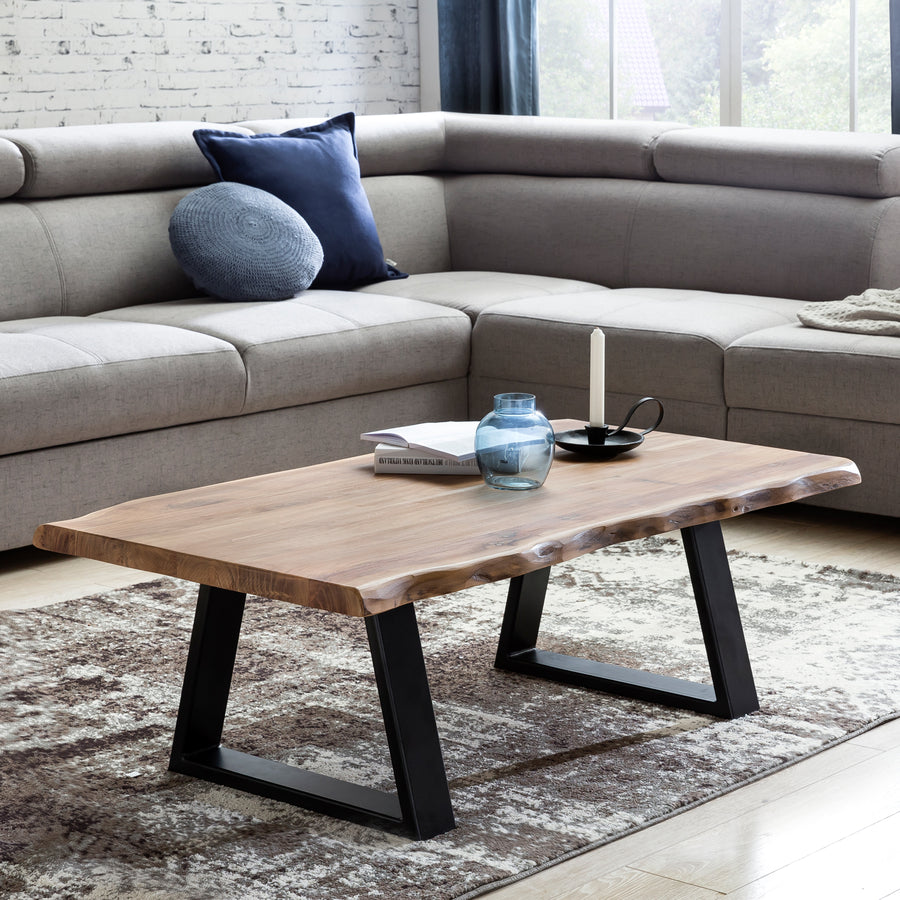 FineBuy Couchtisch Akazie Massivholz 115 cm · Rechteckiger Wohnzimmertisch mit natürlicher Baumkante und schwarzen Metallkufen · Handgefertigter Desig