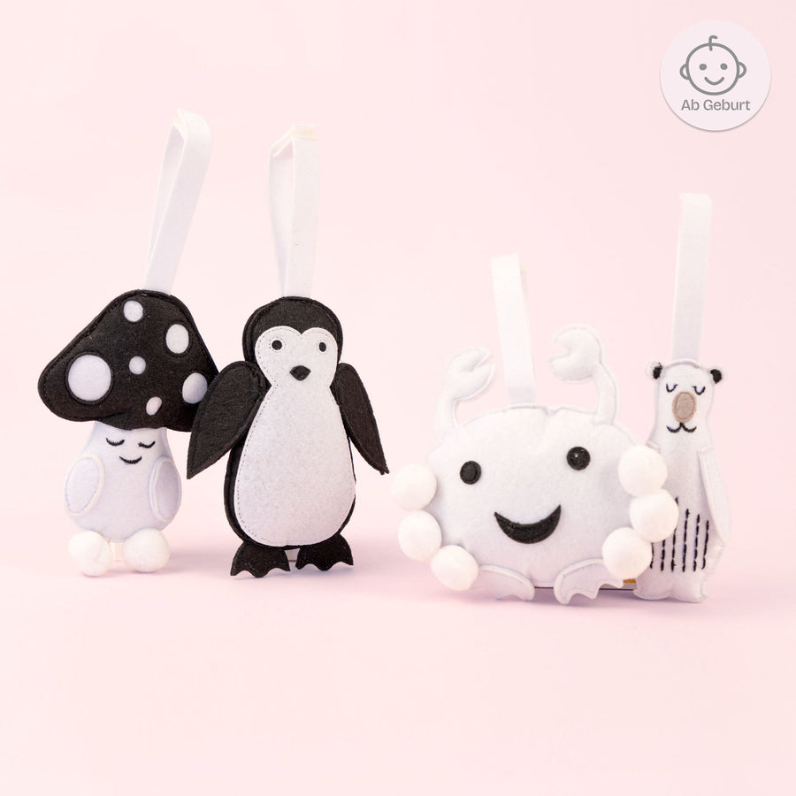 Kontrast Anhänger – Pilz, Pinguin, Krabbe und Eisbär, ab Geburt
