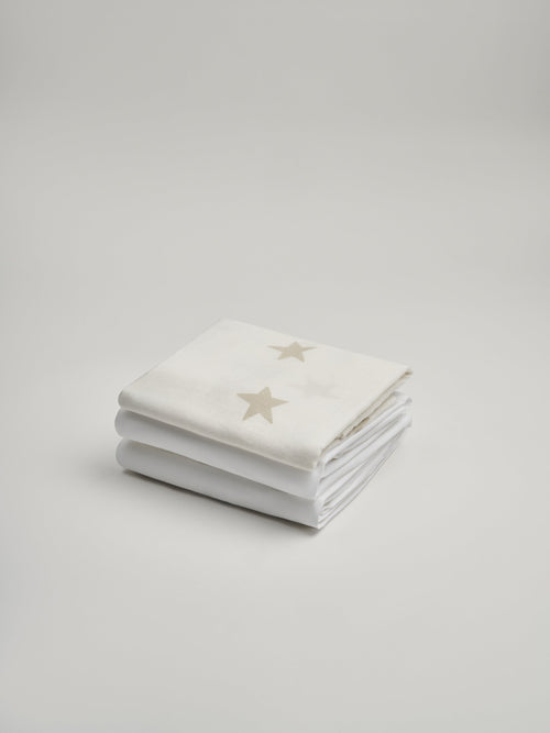 Organic and Fairtrade Cotton Crib Sheet and Muslin Wrap Set | Color: White Stars
