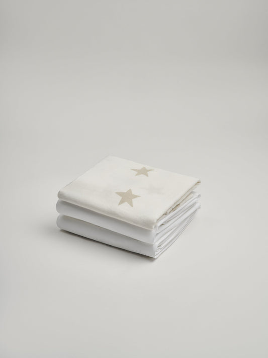 Organic and Fairtrade Cotton Crib Sheet and Muslin Wrap Set | Color: White Stars