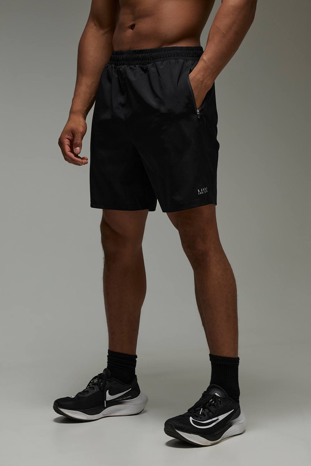 Man Active Regular Fit Stretch Woven 7inch Short | Black | Size Medium