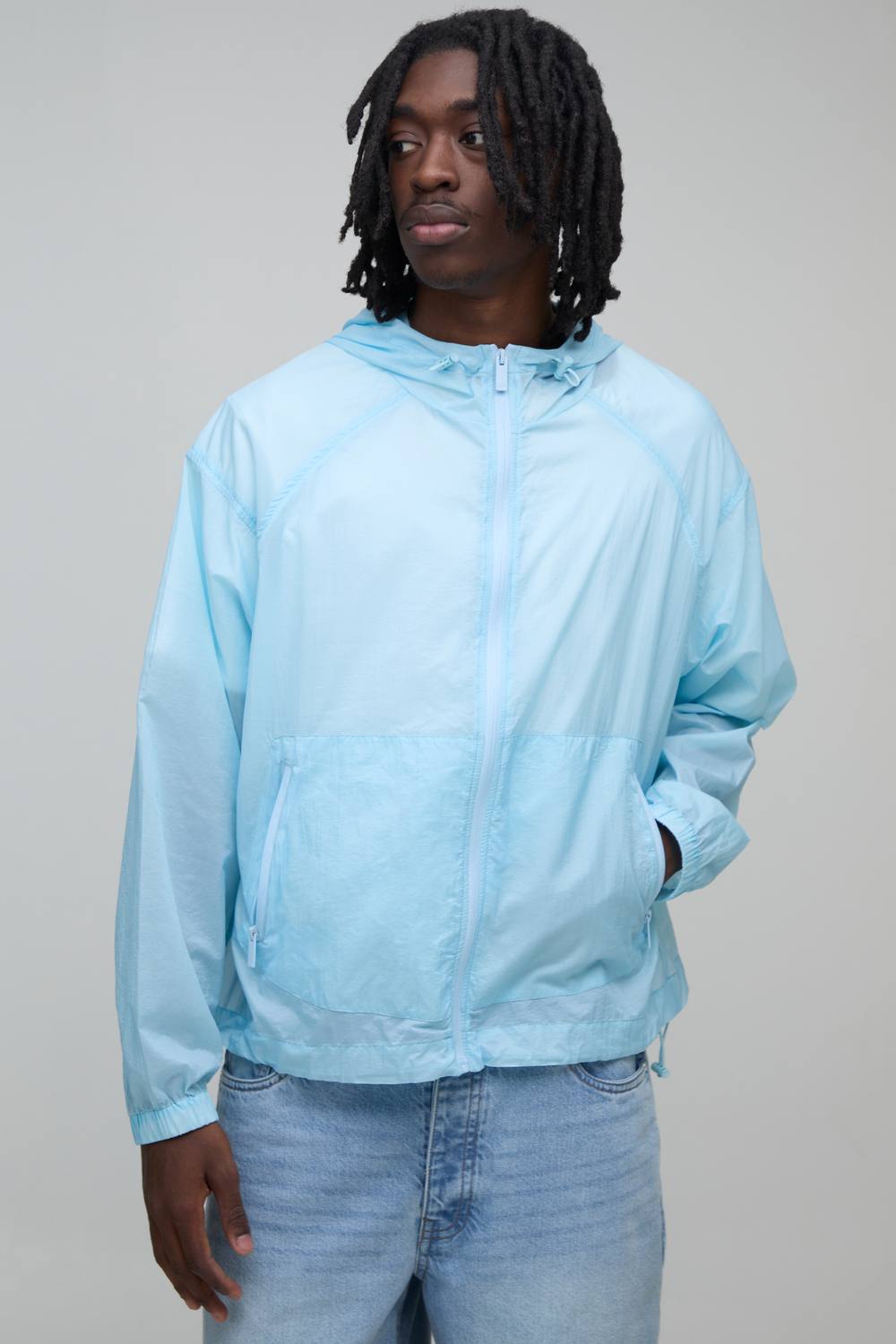 Oversized Glow In The Dark Transparent Hooded Toggle Cagoule | Blue | Size Medium